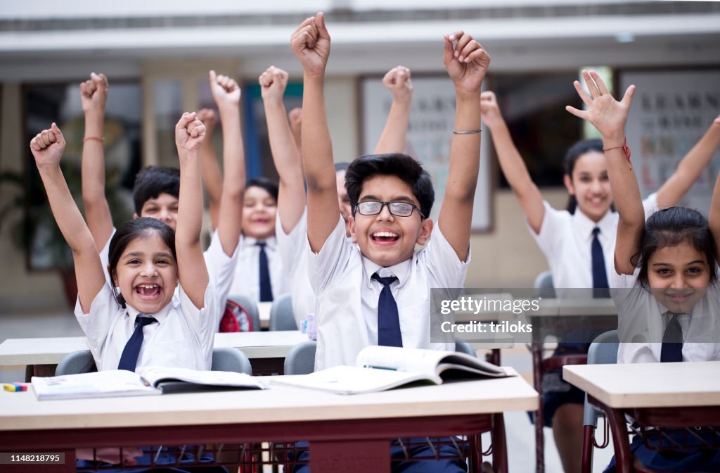 Children Cheering In Classroom High-Res Stock Photo - Getty Images