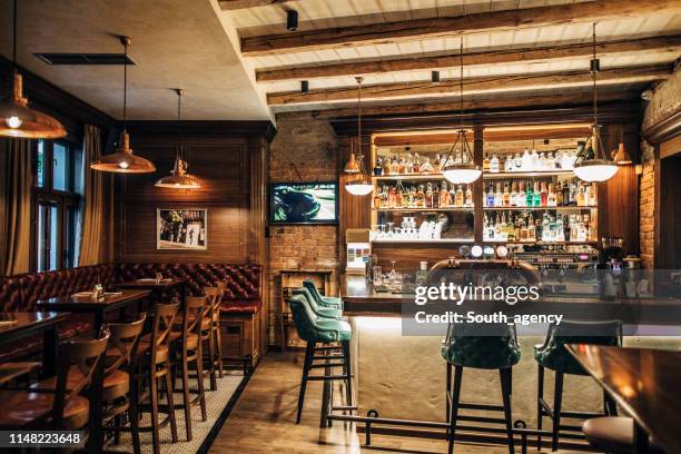 interior of a pub - bar imagens e fotografias de stock