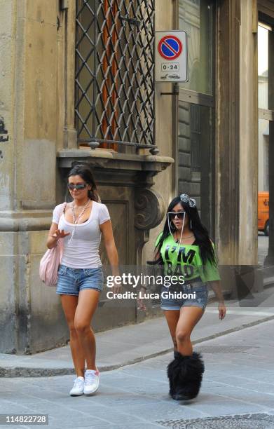Jenni Farley and Nicole Polizzi of the reality TV show "Jersey Shore" go shopping on May 26, 2011 in Florence, Italy.