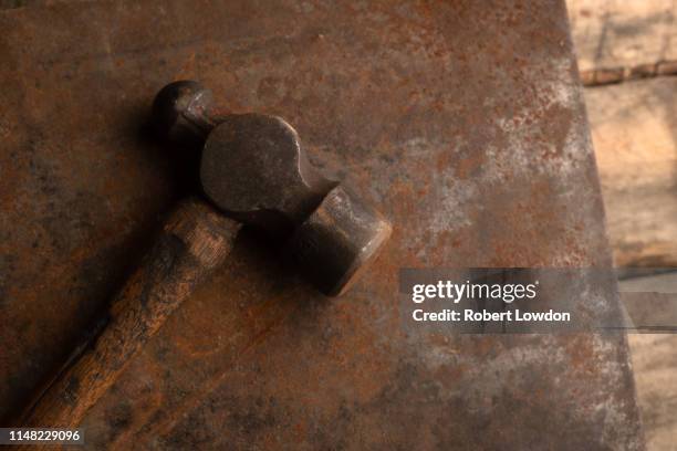 hammer on metal - lb stock pictures, royalty-free photos & images