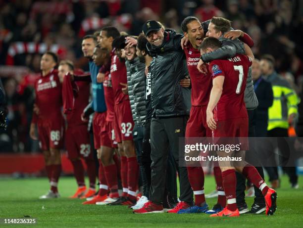 Liverpool manager Jurgen Klopp celebrates with his players after the UEFA Champions League Semi Final second leg match between Liverpool and...