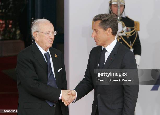 French President Nicolas Sarkozy welcomes Tunisian Prime Minister, Beji Caid el Sebsi to day two of the G8 Summit on May 27, 2011 in Deauville,...