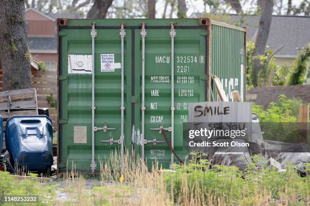 Shipping container of possessions sits on a vacant lot where a home destroyed by Hurricane Michael once stood on May 10, 2019 in Panama City,...