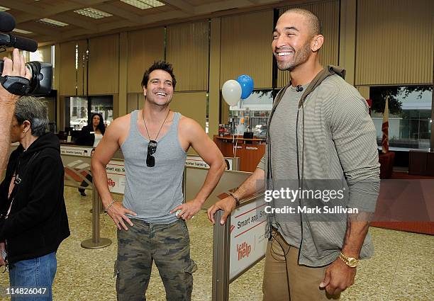 Dodgers Center Fielder Matt Kemp suprises customer Craig DiFrancia during one of his unannounced appearances at Bank of America banking centers in...