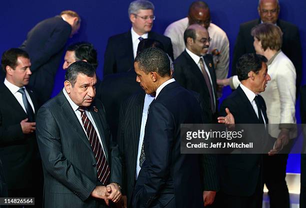President Barack Obama talks with Egyptian Prime Minister, Essam Sharaf during the family photo at the G8 Summitt on May 27, 2011 in Deauville,...
