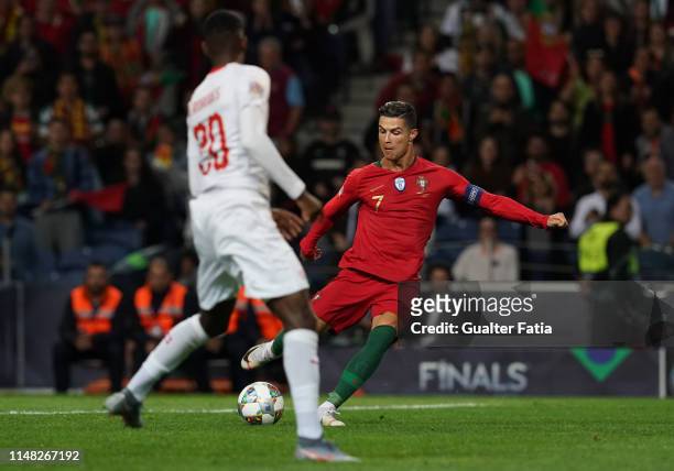 Cristiano Ronaldo of Portugal and Juventus scores goal during the UEFA Nations League Semi-Final match between Portugal and Switzerland at Estadio do...
