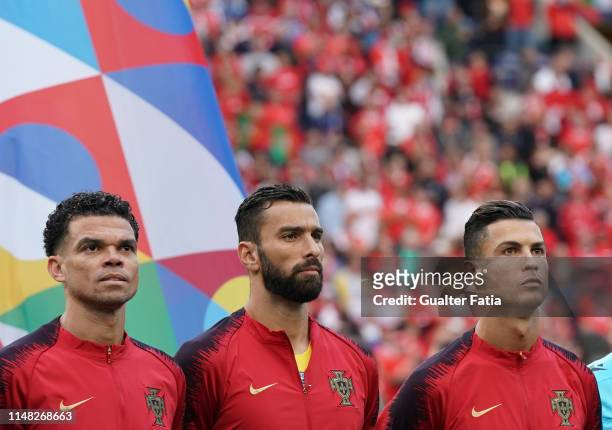Cristiano Ronaldo of Portugal and Juventus with Rui Patricio of Portugal and Wolverhampton and Pepe of Portugal and FC Porto before the start of the...