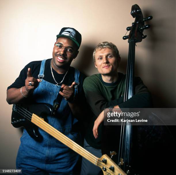 Jazz bassist Christian McBride poses for a joint portrait with bassist Chris Wood of the jazz trio Medeski, Martin and Wood on July 1, 1998 in New...