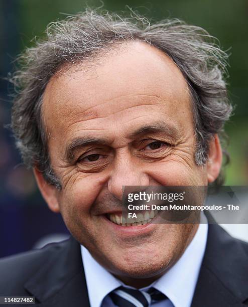 President Michel Platini speaks to the media during the unveiling of a new UEFA sponsored pitch at St Gregory's Catholic Science College on May 27,...