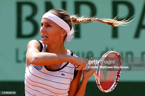 Gisela Dulko of Argentina hits a backhand during the women's singles round three match between Gisela Dulko of Argentina and Samantha Stosur of...