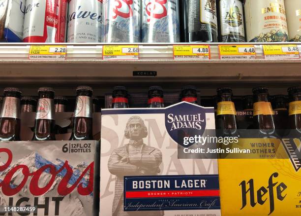 Bottles of Samuel Adams beer are displayed on a shelf at grocery store on May 10, 2019 in San Francisco, California. Boston Beer Company, the second...