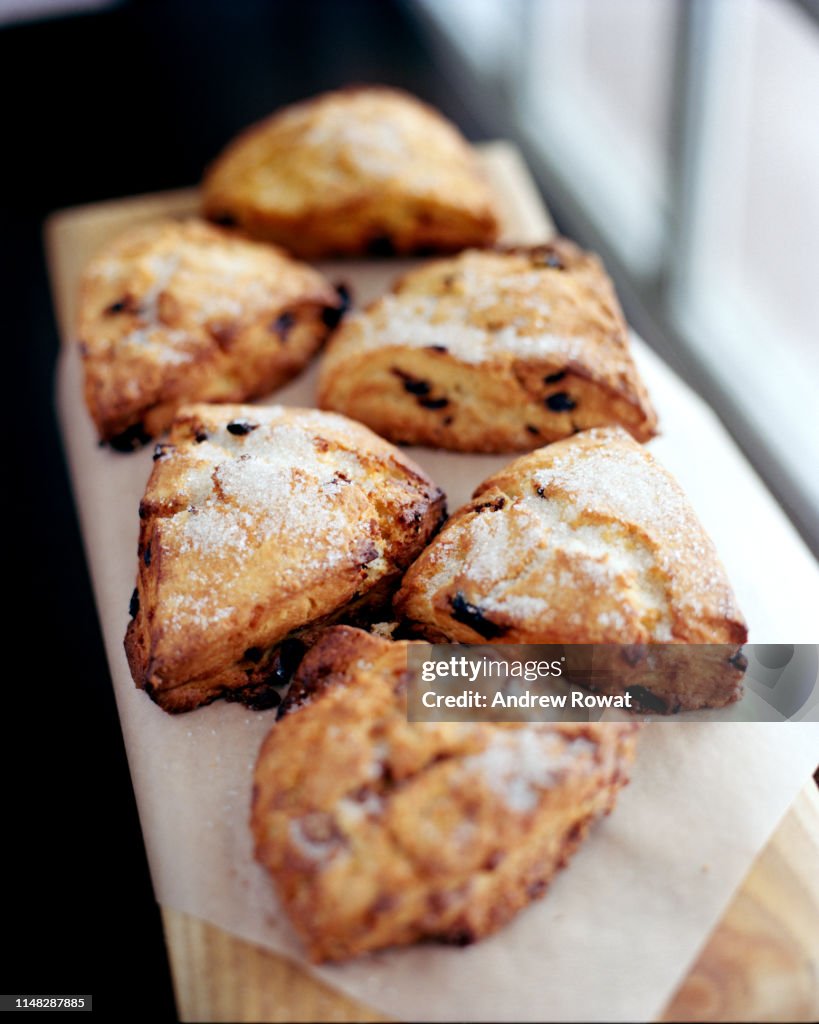 Pictured here is a row of cranberry and cinnamon scones.