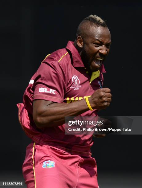 Andre Russell of the West Indies celebrates after dismissing Usman Khawaja of Australia in the pavilion before the ICC Cricket World Cup Group Match...