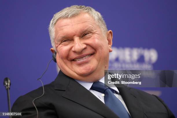 Igor Sechin, chief executive officer of Rosneft PJSC, reacts during a panel session at the St. Petersburg International Economic Forum in St....