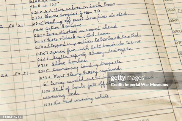 Belfast's logbook at HMS Belfast on June 6, 2019 in London, England. D-Day veterans from Blind Veterans UK were onboard the ship to mark a ceremony...