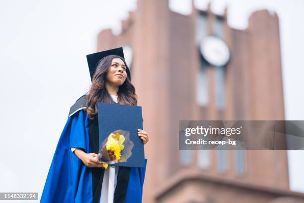 portrait of female college graduate student with diploma - indian wedding gowns stock pictures, royalty-free photos & images