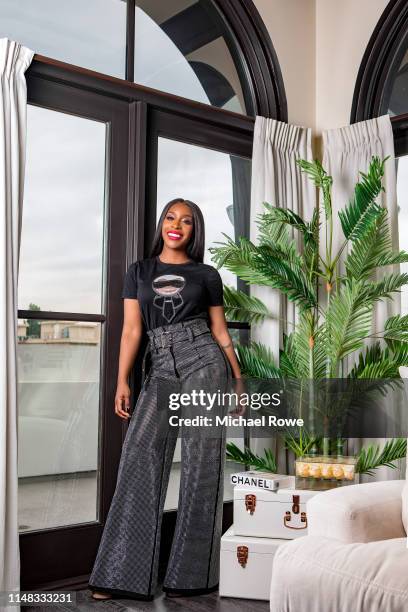 Beauty influencer Jackie Aina is photographed for Buzzfeed on November 18, 2018 at home in Los Angeles, California.