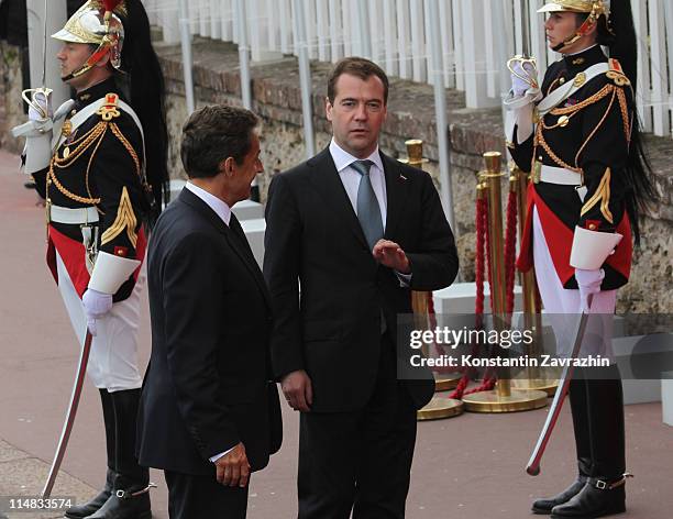 Russian President Dmitry Medvedev and French President Nicolas Sarkozy arrive to the lunch at the G8 Summit on May 27, 2011 in Deauville, France. The...