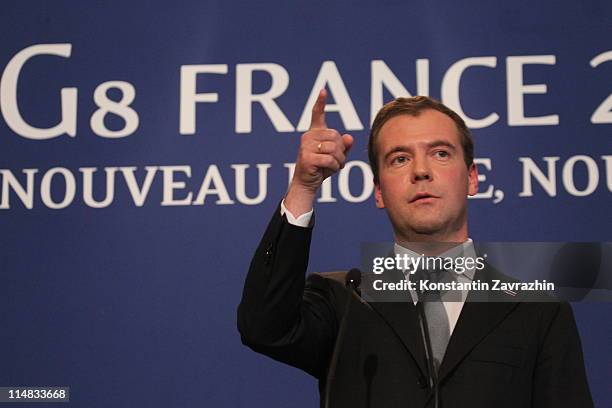 Russian President Dmitry Medvedev speaks during a press conference at the G8 Summit May 27, 2011 in Deauville, France. The Tunisian Prime Minister...