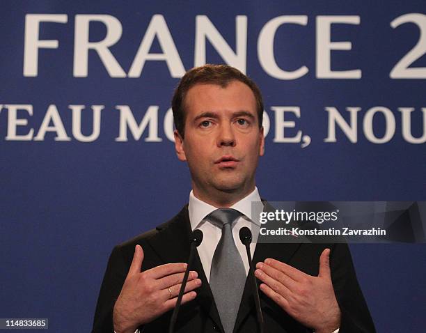 Russian President Dmitry Medvedev speaks during a press conference at the G8 Summit May 27, 2011 in Deauville, France. The Tunisian Prime Minister...