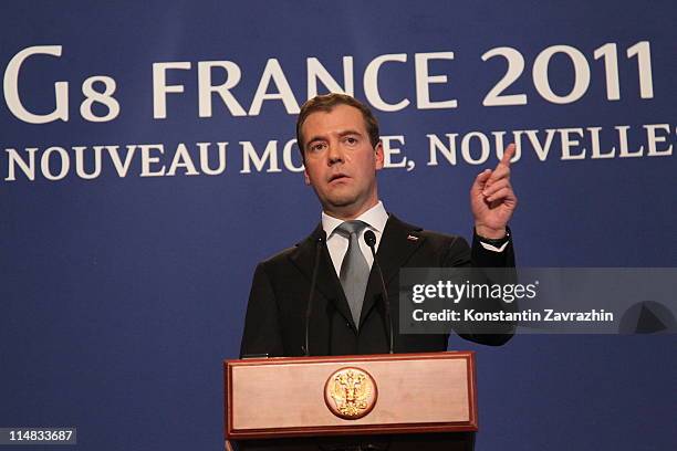 Russian President Dmitry Medvedev speaks during a press conference at the G8 Summit May 27, 2011 in Deauville, France. The Tunisian Prime Minister...