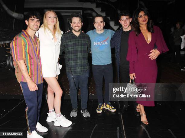 Nick Jonas, Sophie Turner, Alex Brightman, Rob McClure, Nick Jonas and Priyanka Chopra Jonas pose backstage at the musical based on the film...