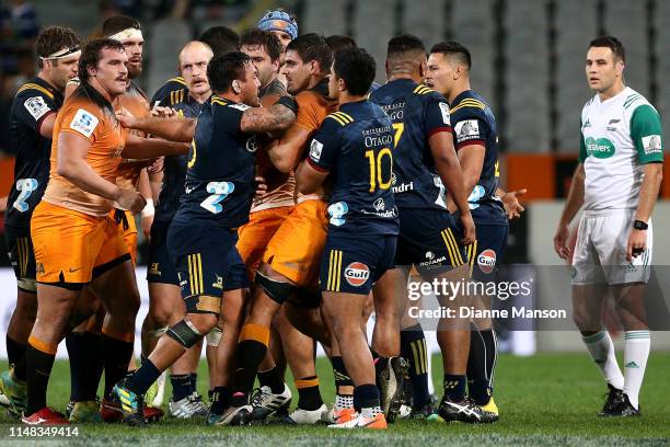 An altercation breaks out between players during the round 13 Super Rugby match between the Highlanders and the Jaguares at Forsyth Barr Stadium on...