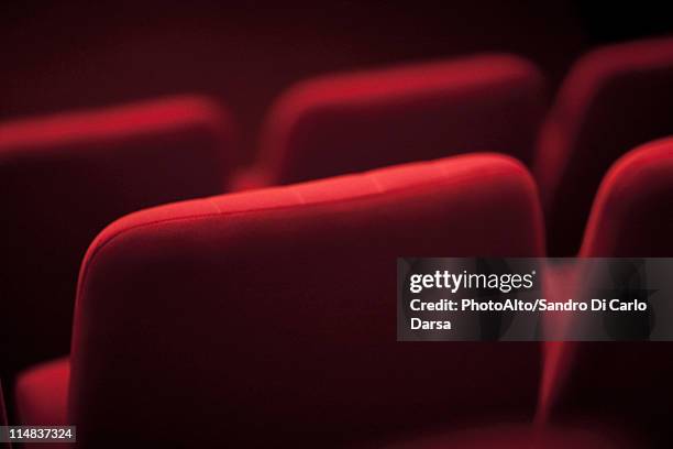 empty theater seats, cropped - kinosaal stock-fotos und bilder