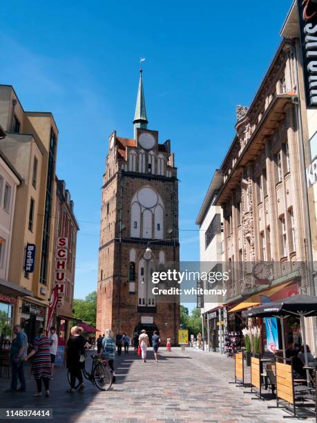 romans gate in kröpeliner street, rostock - rostock stock pictures, royalty-free photos & images