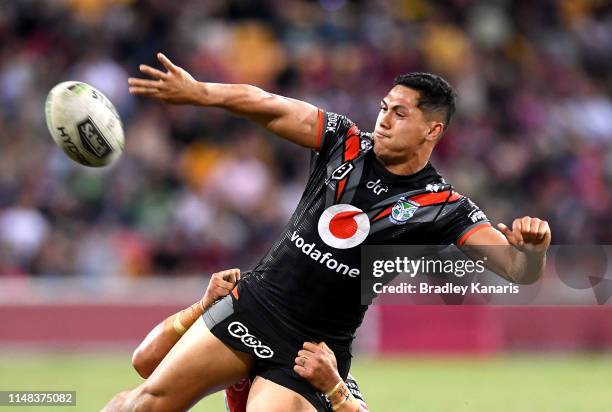 Roger Tuivasa-Sheck of the Warriors offloads during the round nine NRL match between the New Zealand Warriors and the St George Illawarra Dragons at...