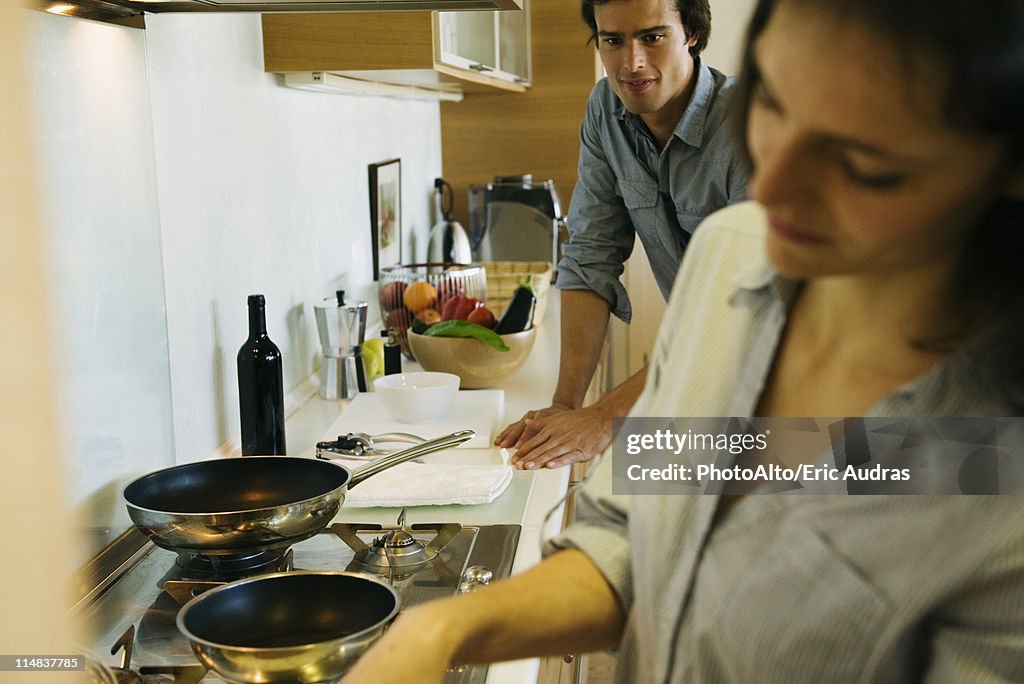 Couple cooking together