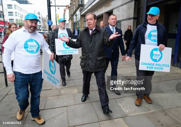 Leader of the Brexit Party Nigel Farage walks through Sunderland Market Place during a Brexit Party campaign visit on May 11, 2019 in Sunderland,...