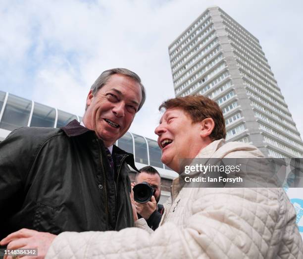 Leader of the Brexit Party Nigel Farage talks with members of the public as he walks through Sunderland Market Place during a Brexit Party campaign...