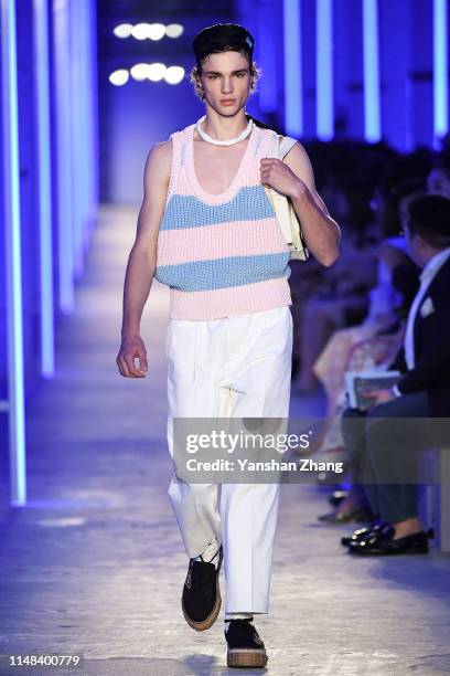 Model showcases designs on the runway during the Prada Spring / Summer 2020 Menswear Fashion Show on June 6, 2019 in Shanghai, China.