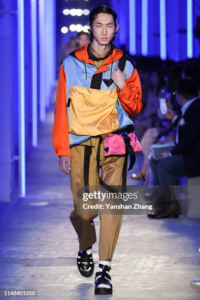 Model showcases designs on the runway during the Prada Spring / Summer 2020 Menswear Fashion Show on June 6, 2019 in Shanghai, China.