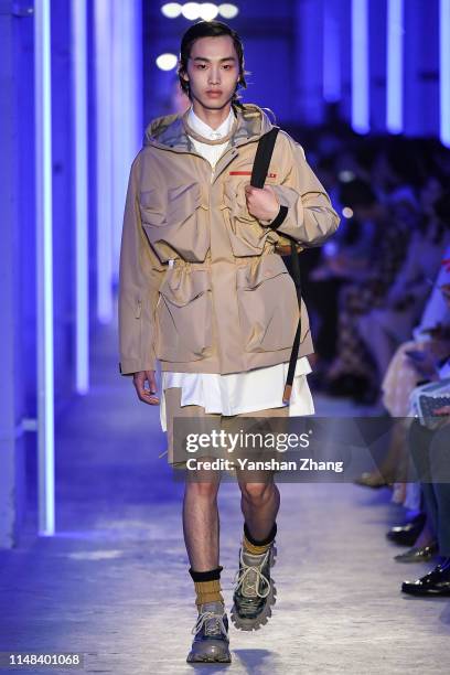 Model showcases designs on the runway during the Prada Spring / Summer 2020 Menswear Fashion Show on June 6, 2019 in Shanghai, China.