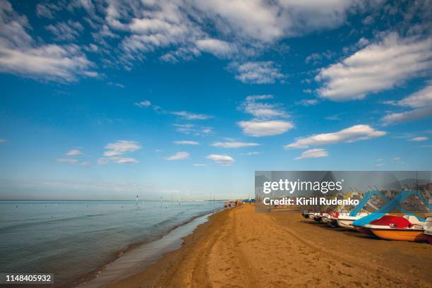 adriatic seashore in bibione, veneto, italy - bibione stock pictures, royalty-free photos & images