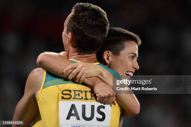 Catriona Bisset and Joshua Ralph of Australia celebrate during the Mixed 2x2x400m Relay Final on day one of the IAAF World Relays at Nissan Stadium...