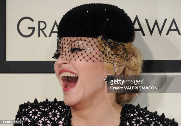 In this file photo taken on February 8, 2015 Seven-time Grammy winner Madonna arrives on the red carpet for the 57th Annual Grammy Awards in Los...