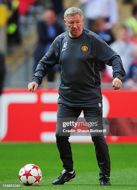 Sir Alex Ferguson manager of Manchester United controls the ball during a Manchester United training session prior to the UEFA Champions League final...