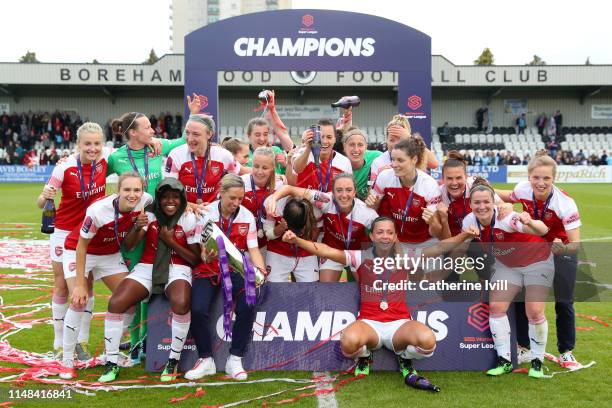 Jordan Nobbs of Arsenal holds the trophy as Arsenal celebrate winning Women's Super League after the WSL match between Arsenal Women and Manchester...