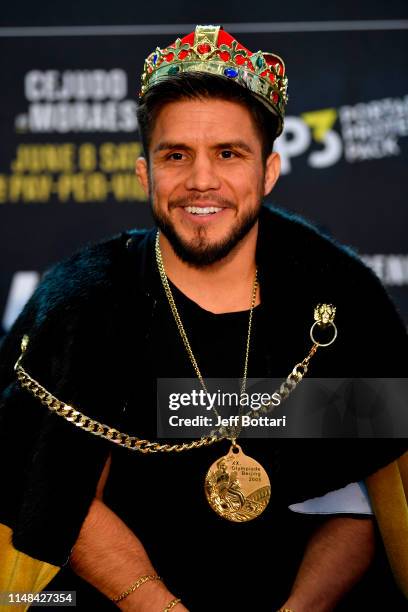 Flyweight champion Henry Cejudo interacts with the media during the UFC 238 Ultimate Media Day at the United Center on June 6, 2019 in Chicago,...