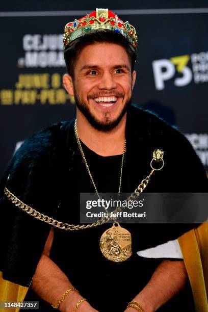 Flyweight champion Henry Cejudo interacts with the media during the UFC 238 Ultimate Media Day at the United Center on June 6, 2019 in Chicago,...