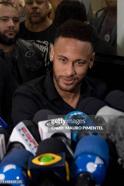 Brazil's star striker Neymar leaves a Police Station after giving a statement to police for posting intimate WhatsApp messages with Najila Trindade...