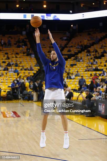 Klay Thompson of the Golden State Warriors warms up before Game Five of the Western Conference Semifinals of the 2019 NBA Playoffs at ORACLE Arena on...