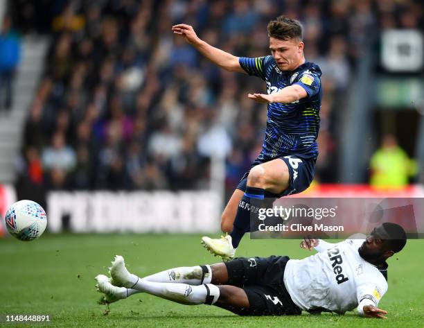 Fikayo Tomori of Derby County challenges Jamie Shackleton of Leeds United during the Sky Bet Championship Play-off semi final first leg match between...