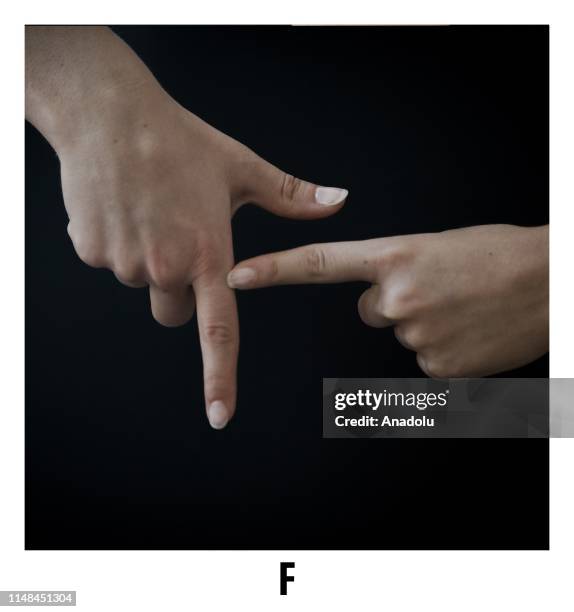 How To Sign F F In Sign Language Photos and Premium High Res Pictures - Getty Images