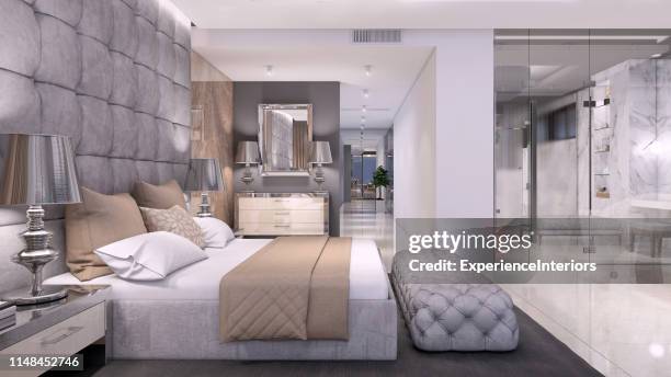 dormitorio de planta abierta de lujo interior con baño con pared de cristal - hotel suite fotografías e imágenes de stock