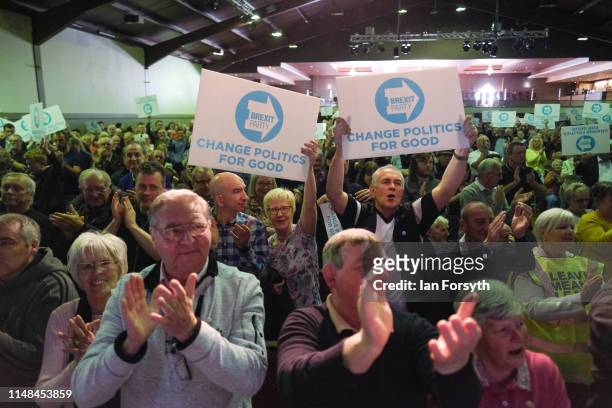 Brexit Party supporters react to speeches during a Brexit Party event at Rainton Meadows Arena in Houghton Le Spring on May 11, 2019 in Durham,...