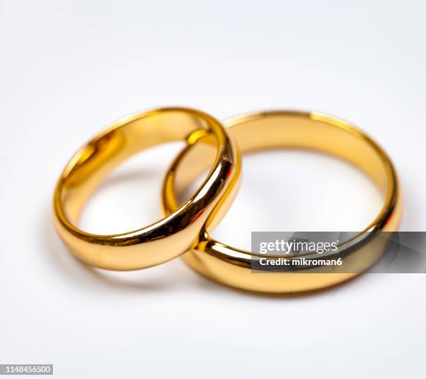 close-up of wedding rings - open round two stock pictures, royalty-free photos & images